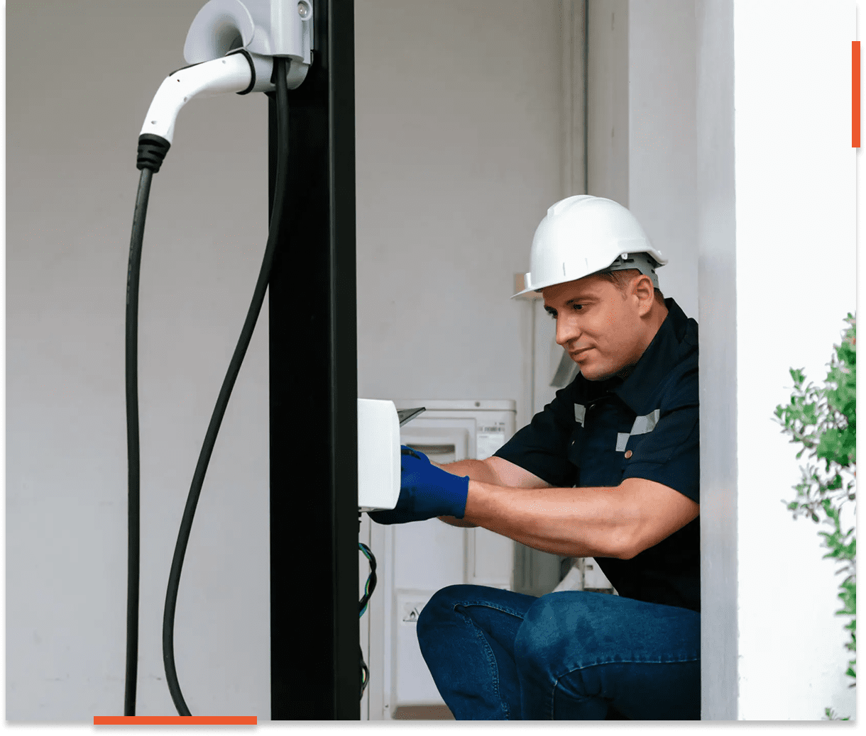 Technician working on charging unit installation